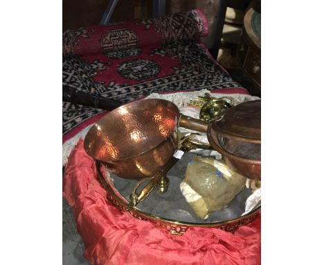 An adjustable ceiling light with pulley, a small quantity of copper and a hearth rug