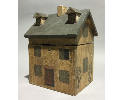 A house form tea caddy