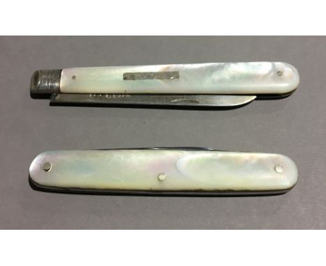 Two silver bladed mother-of-pearl fruit knives