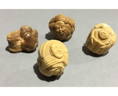 Four carved netsuke