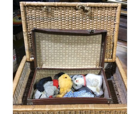 A child's small brown suitcase containing three Chad valley puppets and others