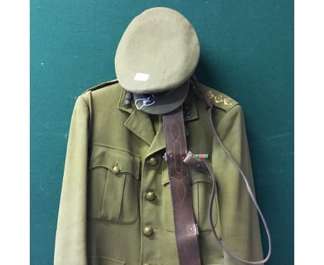 A WWII British Army officer's tunic, a Sam Browne belt and cap, Captain Royal Engineers 1941-1945