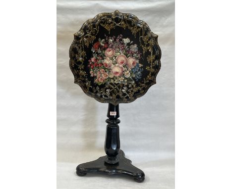 A Victorian papier-mache snap-top pillar table, the top painted with summer flowers, mother-of-pearl inlaid and parcel gilded