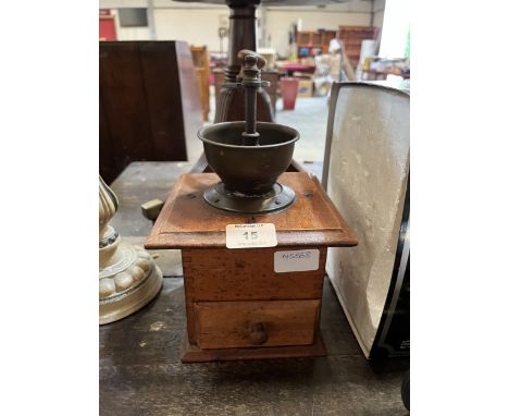 An early 20th century French coffee grinder. 10" high