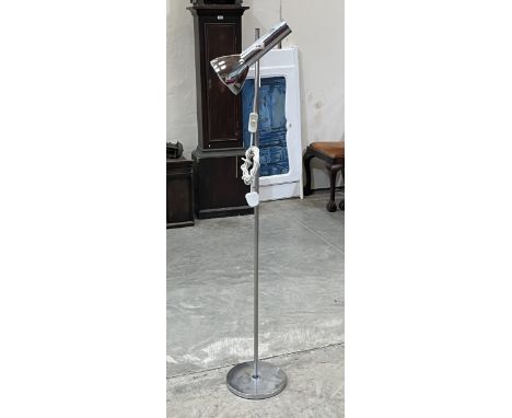 A chromium plated floor lamp