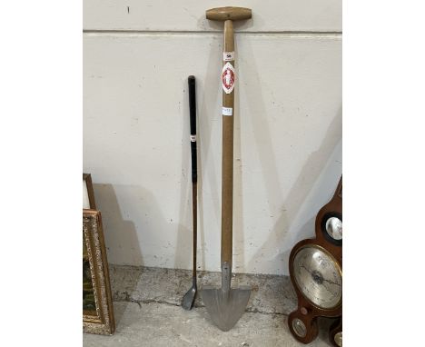 A Sneeboer shovel and a hickory shafted golf club