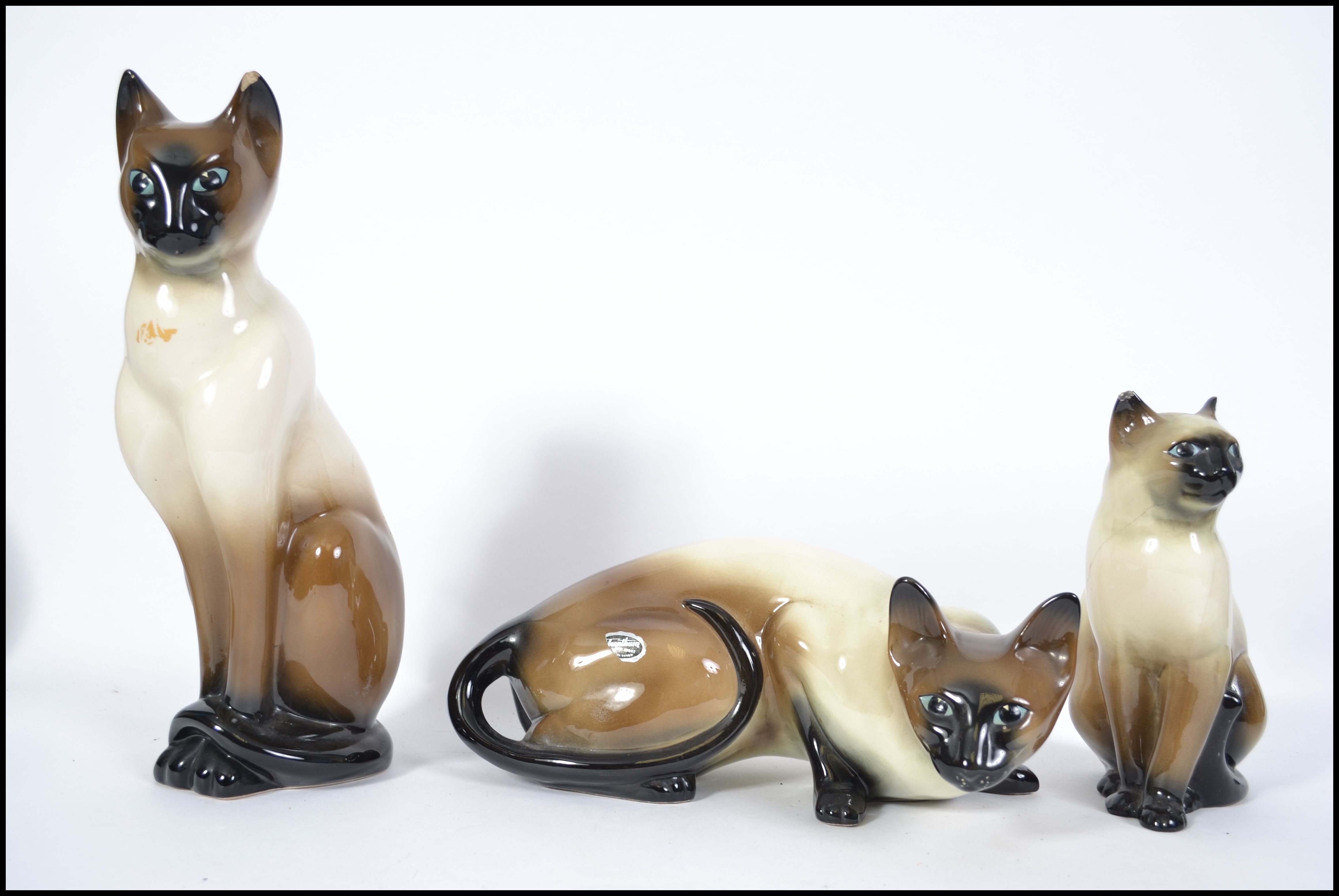 A set of 3 vintage Staffordshire large ceramic  siamese  cat  