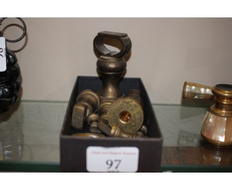 A tray of scale weights and three brass padlocks 