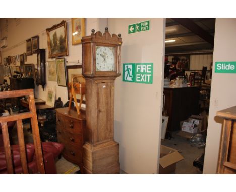 A 19th Century oak long case clock with painted dial