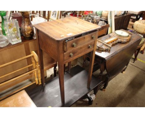 A 19th Century mahogany work table fitted two drawers with contents - one item to be viewed behind cabinet