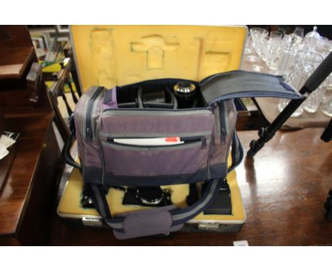 A Pentax ME Super camera and lenses