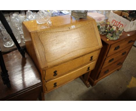 A light oak two drawer bureau