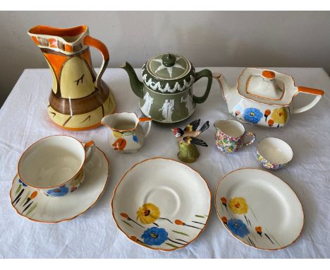 A selection of ceramics to include a green Carlton Ware teapot, a hand painted Myott & Son jug, a hand painted  Myott & Son t