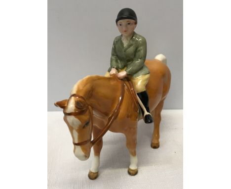 A Beswick Huntsboy on light brown pony. Approx. 14.5cms h x 16.5cms l.Condition ReportVery good condition, no issues.