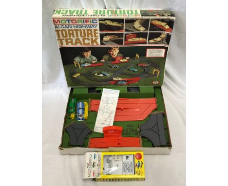 Ideal Toys. Motorific Alcan Highway Torture Track with original box, playworn with assembly instructions.Condition ReportSign