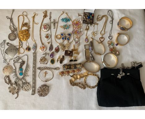 A quantity of vintage costume jewellery to include black evening bag, silver filigree pendants, rings, cufflinks, bracelets, 