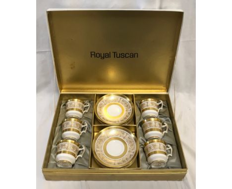 A set of Royal Tuscan tea ware comprising six cups and saucers with gilt decoration in a presentation box. Cups 6cms h, sauce