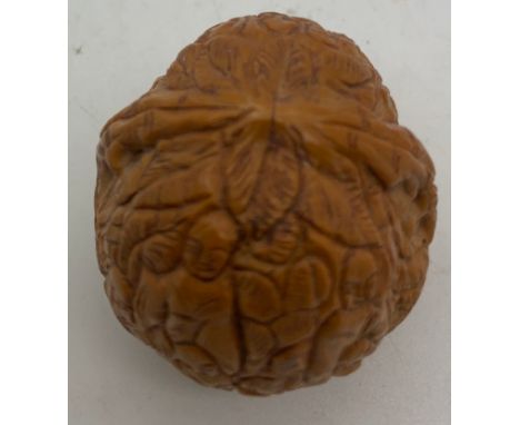 A Chinese Hediao carved walnut shell with leaves and figures, 4cm l.Condition Reportlight colour, no visible cracks or repair