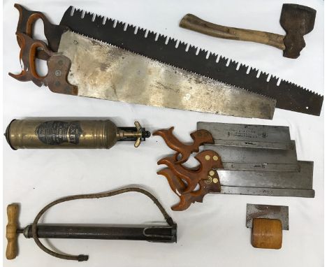 A collection of vintage tools to include two large wooden handled saws, largest with large tooth blade has no makers name 89c