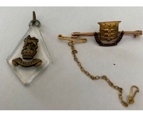 A 9ct Army Ordnance Dept. brooch with safety chain (untested) and Fide et Fiducia pendnt. Brooch 2.1gCondition ReportGood con