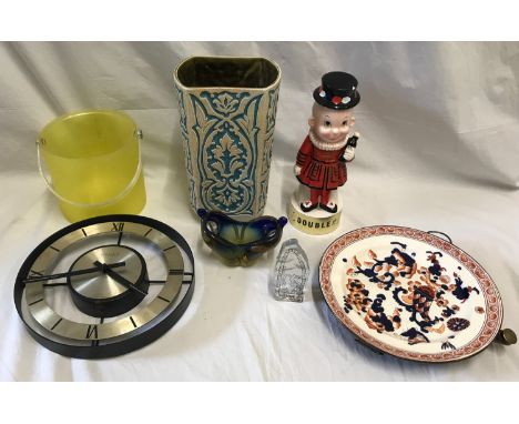 A selection to include a Beswick light blue and cream ceramic vase, a novelty beefeater musical liquid container stamped fore