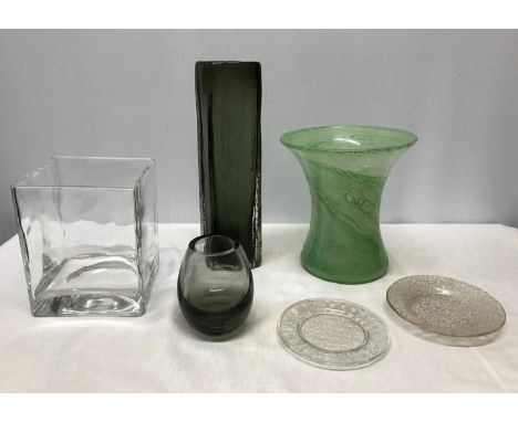 A collection of glassware to include a tall decorative retro vase c1960 in dark green 30.5cm, a dark green small bulbous vase