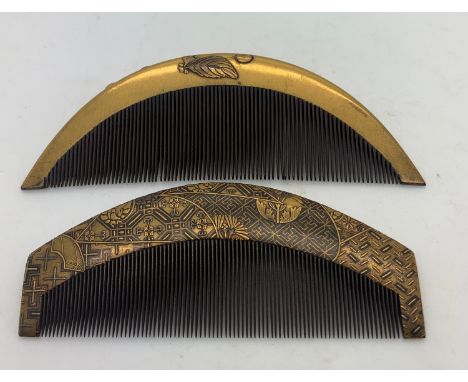 Two metal and wood Japanese Kushi combs with oval shape. Embossed and layered metal to both and 3 coral stone detail to one. 