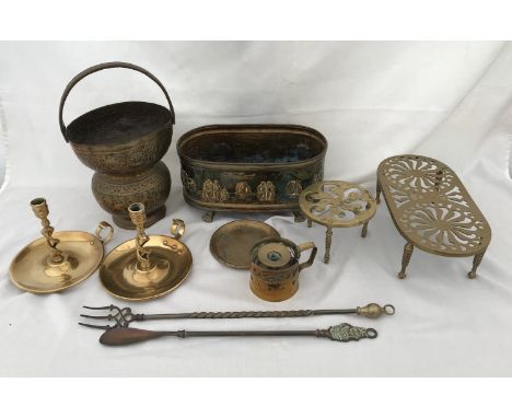 A selection of brassware to include, Indian brass, barley twist chamber sticks, toasting fork, two trivet stands, a shoe horn
