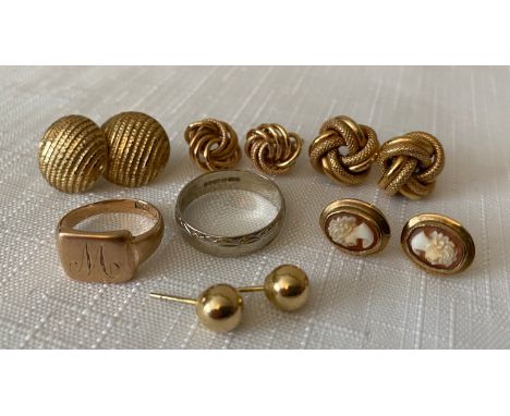 Five pairs of 9ct gold earrings and two 9ct rings, one signet inscribed "M" size K and a white gold wedding band size Q. Tota