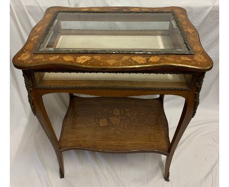 An inlaid vitrine with gilt metal mounts, floral inlay and bevelled glass to the top. 42cms x 62cms.Condition ReportVery slig