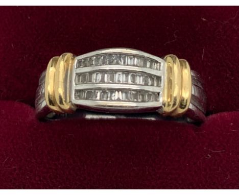 A contemporary diamond set, two coloured dress ring. Tests as 18ct carat white and yellow gold. Size T. 6.2gms.Condition Repo