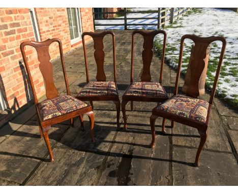 A set of 4 mahogany Queen Anne dining chairs with floral tapestry upholstering.Condition ReportWood with scuffs to front and 