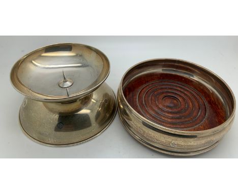 A hallmarked Sheffield silver pricket candlestick by Carrs of Sheffield bearing millennium mark together with a London bottle