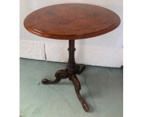 A 19thC burr walnut carved pedestal table with tripod legs. 51cms d x 66cms h.Condition ReportGood condition.