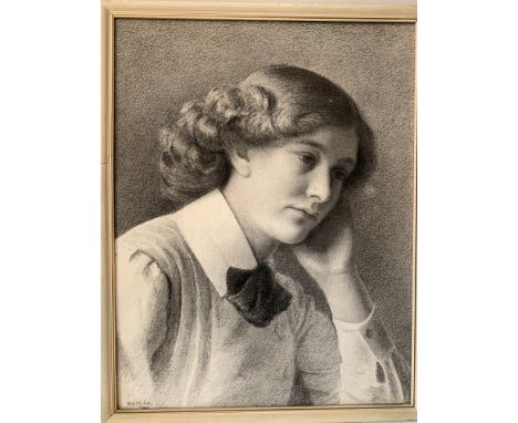 A Charcoal portrait of a young woman signed L.F.A. Taylor 1910 initialled E.S.K. (examined South Kensington Art School) 46cms