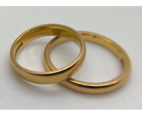 Two 22 ct gold wedding bands. Size K and N. Total weight 7.49gms.Condition ReportGood.