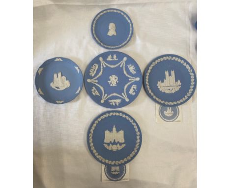 A collection of five Wedgwood Jasperware plates to include: York Minster 1987, Westminster Abbey 1987 with booklet, Horse Gua