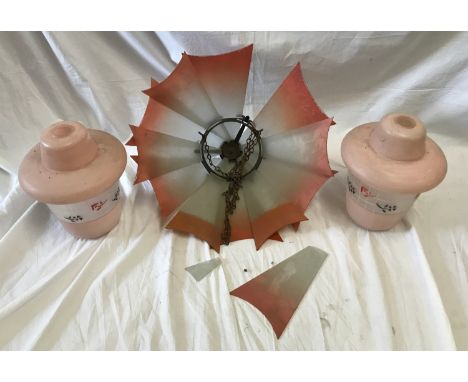 A pair of pink glass ceiling light shades 25cm h and a glass fan ceiling light 42cms w.Condition ReportFan light with one bro
