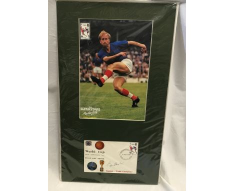 World Cup 1966 first day cover signed Bobby Charlton, mounted with a photo print and World Cup stamp. Mont size 31cm w x 53.5