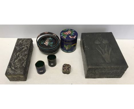 A cloisonne lidded jar with dragon decoration 8cms h, dishes in a carry basket 10cms w, 2 small beakers 4.5cms h and a pill b