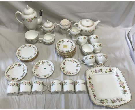 A Wedgwood Mirabelle tea and coffee set to include a coffee pot, a teapot, 2 lidded pots, 2 cream jugs, a sugar bowl, 6 tea c