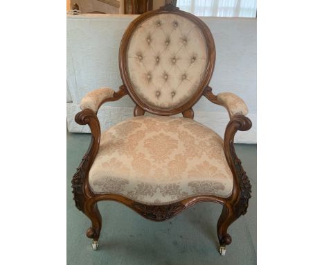 A very good quality 19thC walnut button backed open armchair with scroll arms and cabriole legs on white ceramic and brass ca