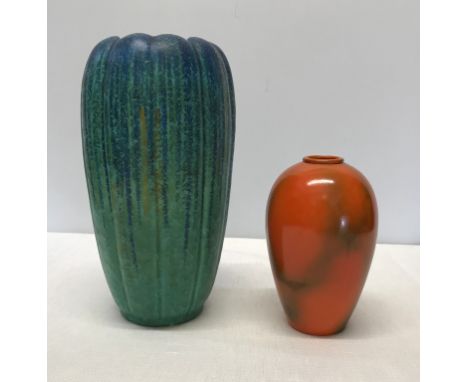 Two Bretby Art Pottery vases one a small orange vase 16.5cm marked to base, made in England, the Bretby logo and 2217B togeth