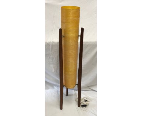 A mid century teak floor standing Rocket Lamp with orange fibreglass shade. 106cm h x base width 24cm.Condition ReportBreak t