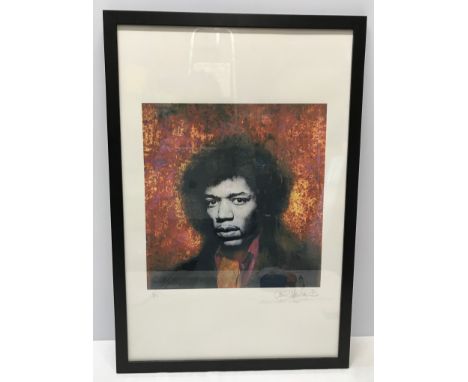 A mounted and framed limited edition print 2/50 by noted photographer Gered Mankowitz of Jimi Hendrix. Signed in pencil to lo