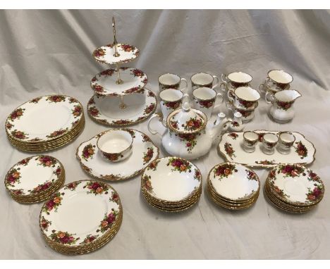 A Royal Albert Old Country Roses Tea and Dinner service set to include a teapot 20cms h, cake stand, 6 x tea cups, 4 x mugs, 