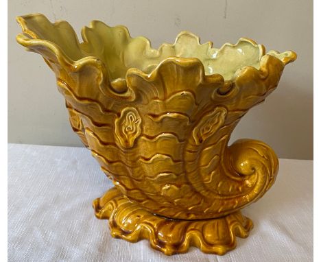 A Leeds Art Pottery yellow cornucopia jardinière, impressed marks to base number RD205740  368.Condition ReportCrackles to gl