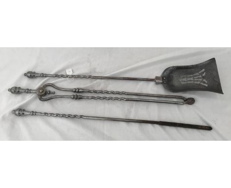 A set of three polished cast iron fireside tools with barley twist stems.Poker length 74cmCondition ReportLight surface rust.