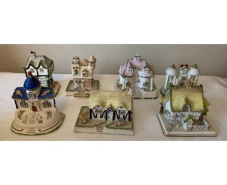 Seven various Coalport cottages to include "The Master House", "Twin Towers", "Elizabethan Cottage", "The Blue House" and "Th