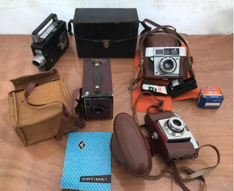 A collection of vintage cameras to include Kodak Portrait Brownie Number 2, Kodak Coloursnap 35 model2, Cine Kodak Magazine 1